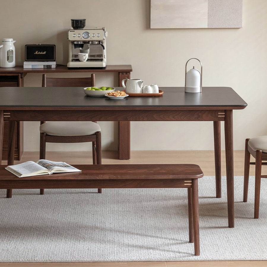 Walnut wood single ceramic top dining table