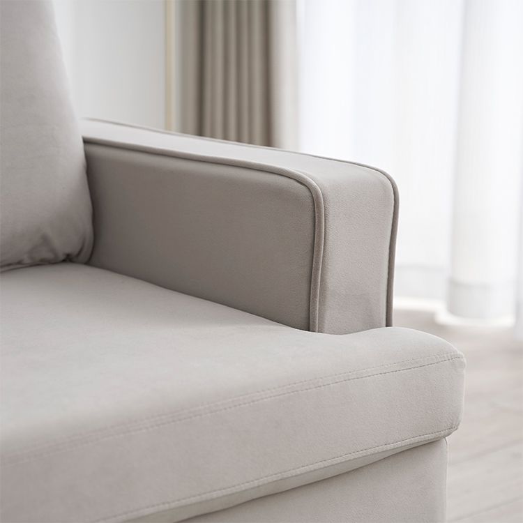 Velvet-like 2-seater couch with storage