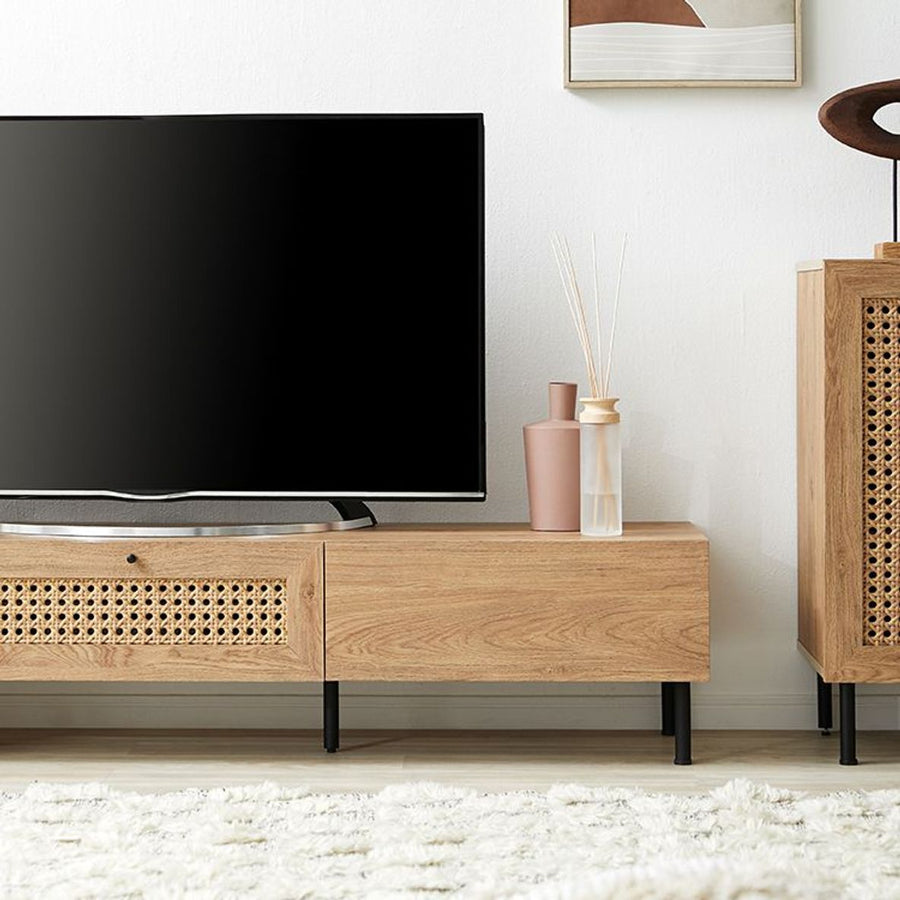 Steel-legged TV stand with rattan finish and cord hole