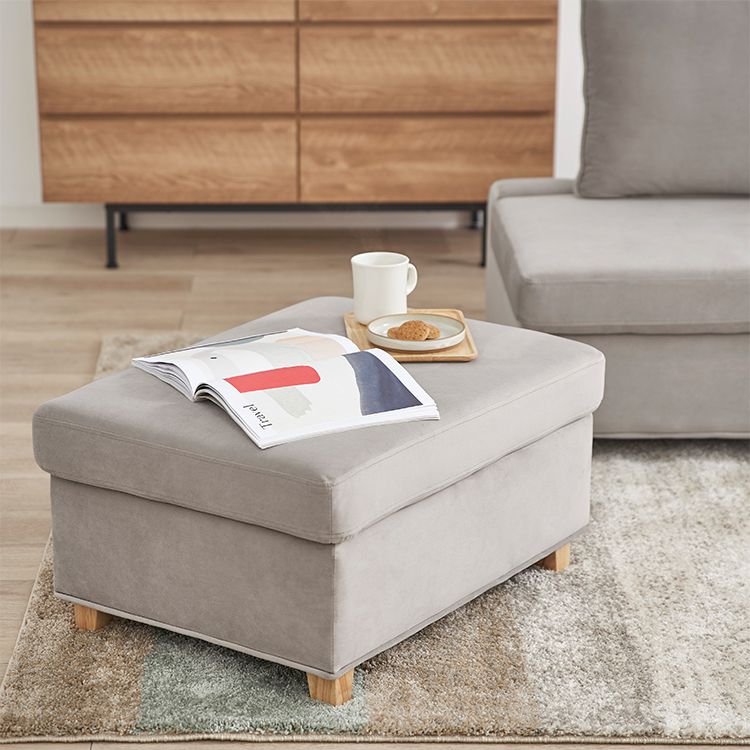 Velvet-like 2-seater couch with storage