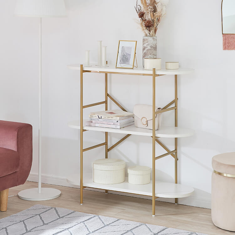 A stylish open shelf in white and gold with 3 tiers