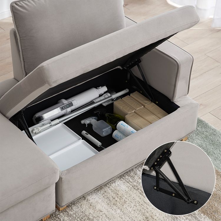 Velvet-like 2-seater couch with storage
