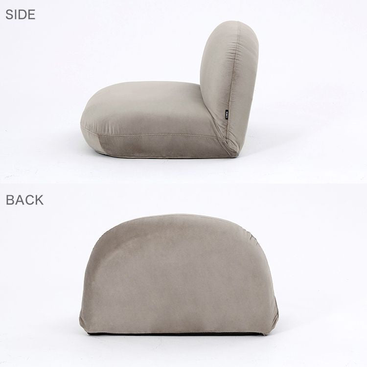 A velvet-like chair with a stylish, plump design