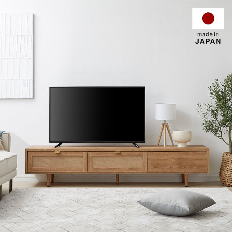 Japanese-made TV stand with flap doors and storage space, wooden legs