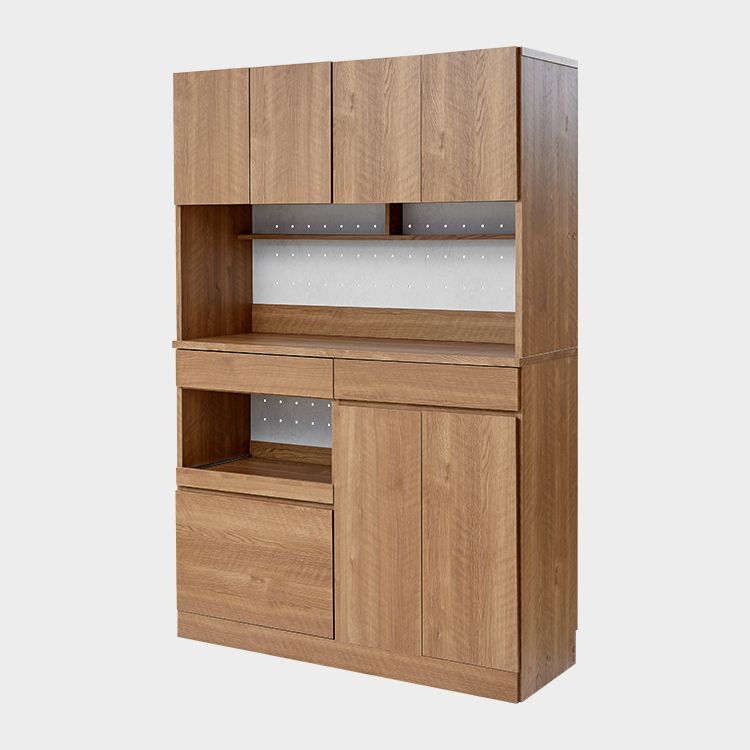 Kitchen cabinet with storage for cooking utensils