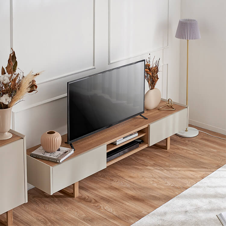 A stylish TV stand in shabby natural and beige