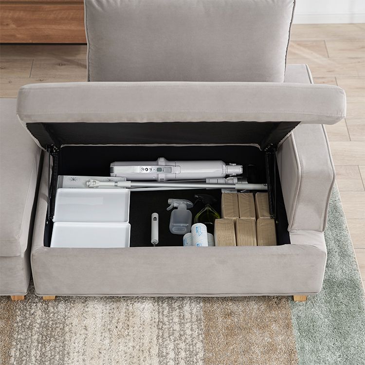 Velvet-like 2-seater couch with storage
