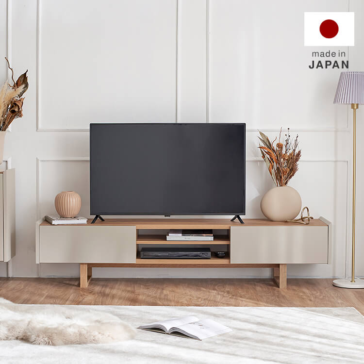 A stylish TV stand in shabby natural and beige
