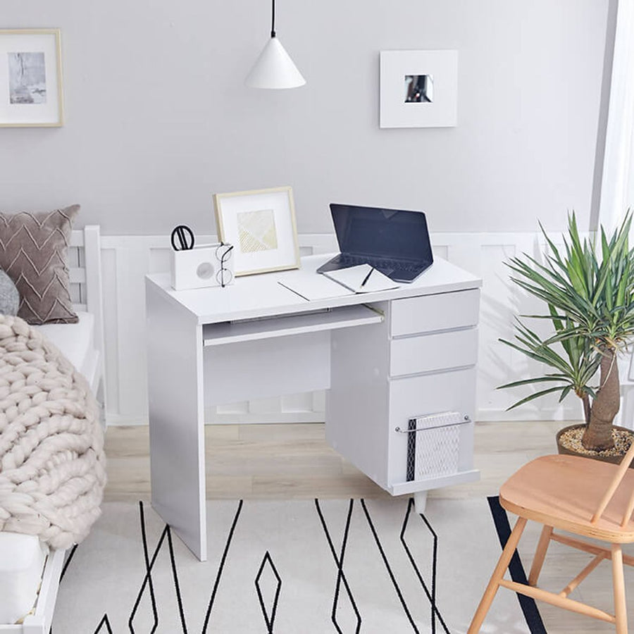 Computer desk with integrated storage for A4 size documents