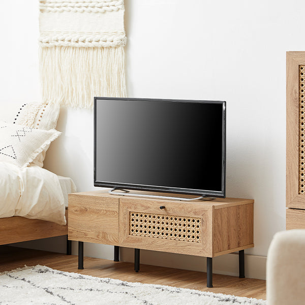 Wooden TV stand with rattan look, cord hole and legs