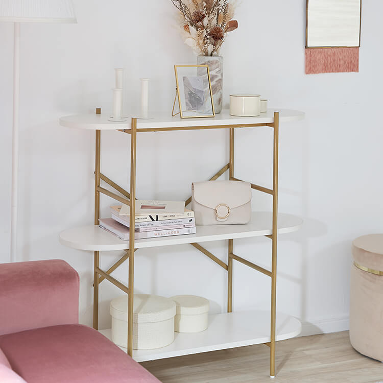 A stylish open shelf in white and gold with 3 tiers