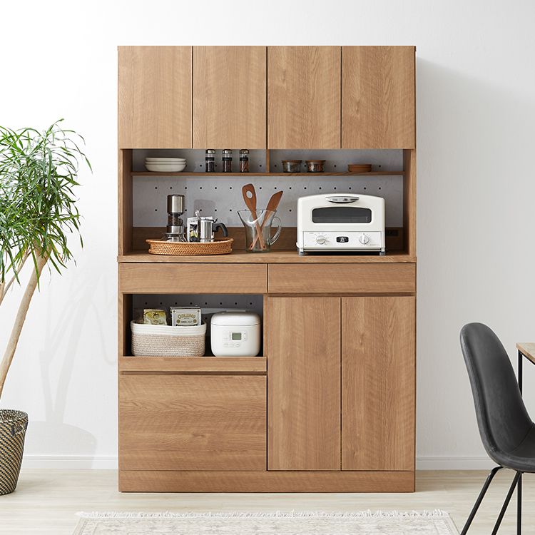 Kitchen cabinet with storage for cooking utensils