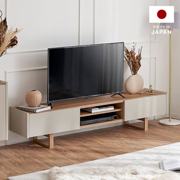 A stylish TV stand in shabby natural and beige