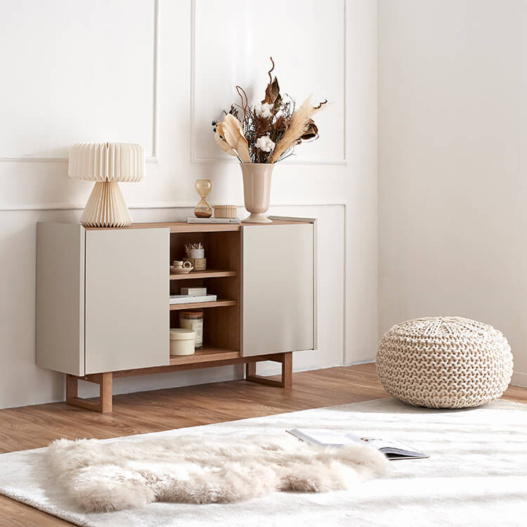 A stylish sideboard in shabby natural and beige