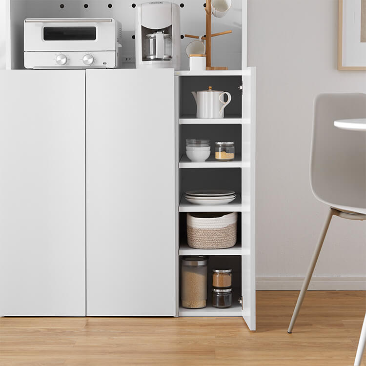 A cupboard perfect for storing things above trash cans