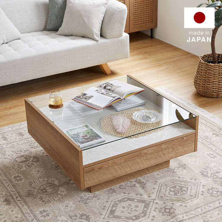 Wooden center table with glass top and stone effect