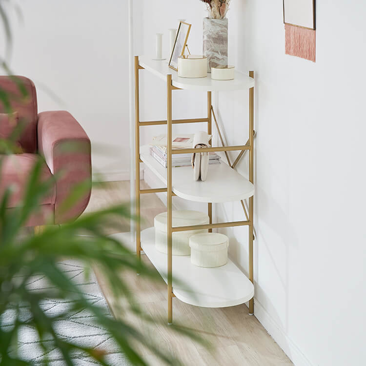 A stylish open shelf in white and gold with 3 tiers