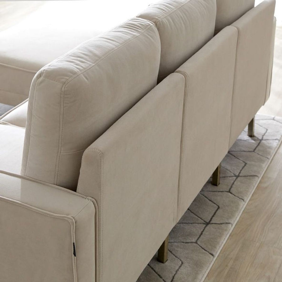 Velvet-like 3-seater couch with steel legs