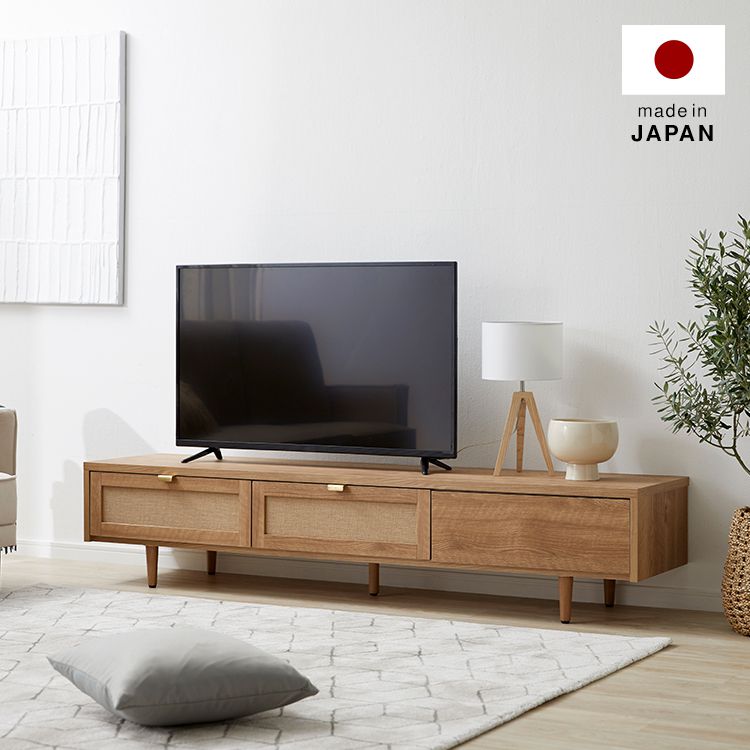 Japanese-made TV stand with flap doors and storage space, wooden legs
