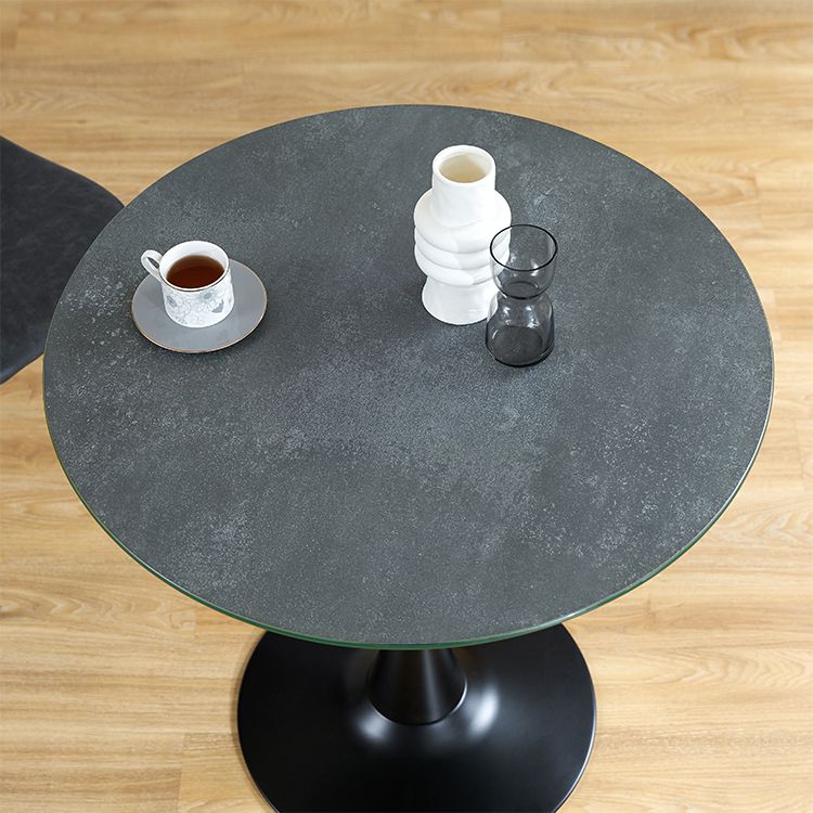 Marble-look round table with glass top, compact