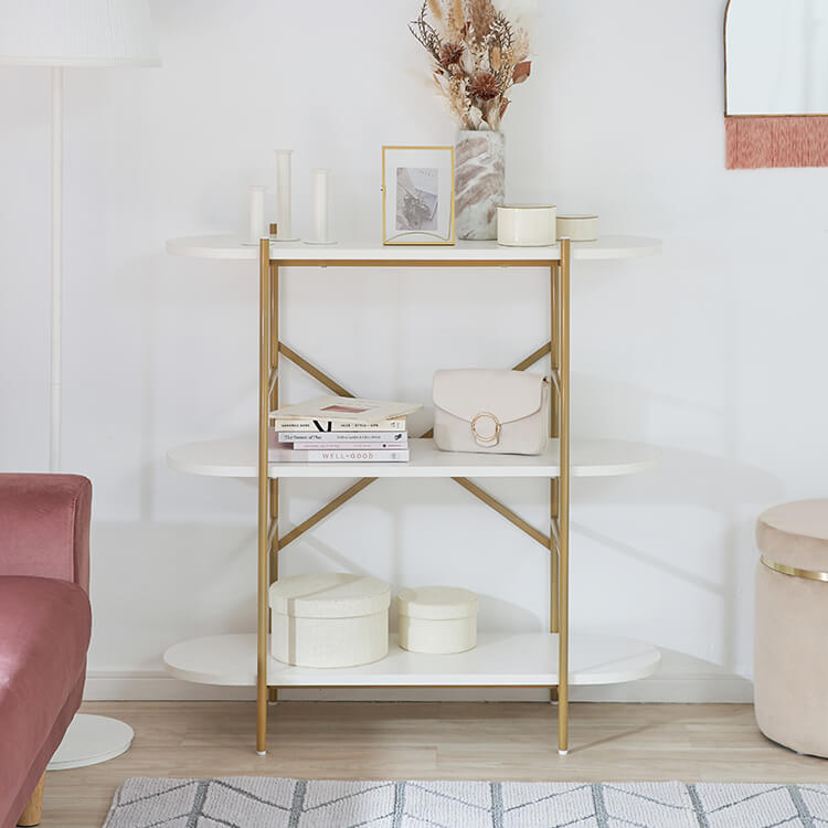 A stylish open shelf in white and gold with 3 tiers