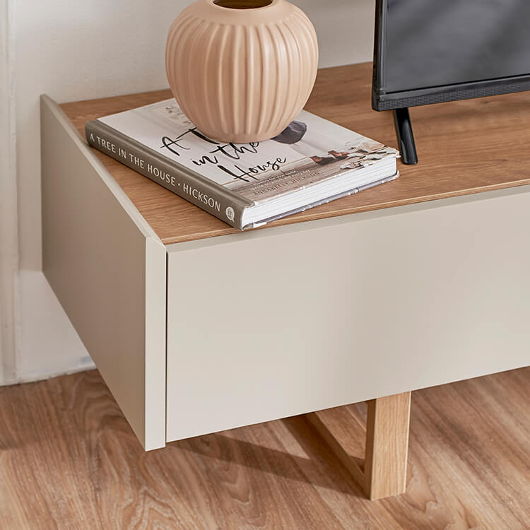 A stylish TV stand in shabby natural and beige