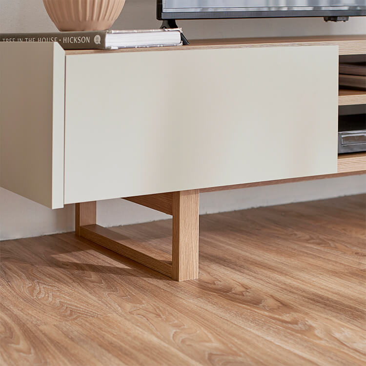 A stylish TV stand in shabby natural and beige