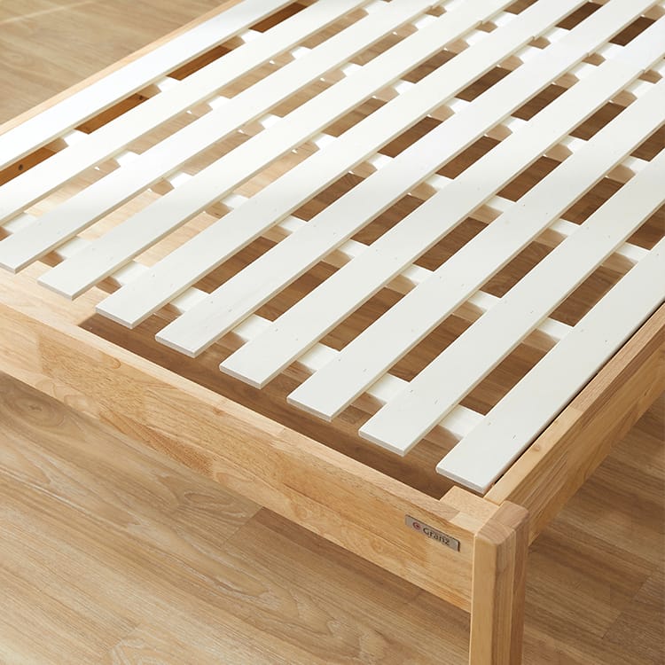 Slatted bed with headboard made of solid wood [S]