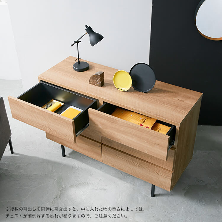 Domestically produced low chest of drawers, storage, with legs, made of wood and steel